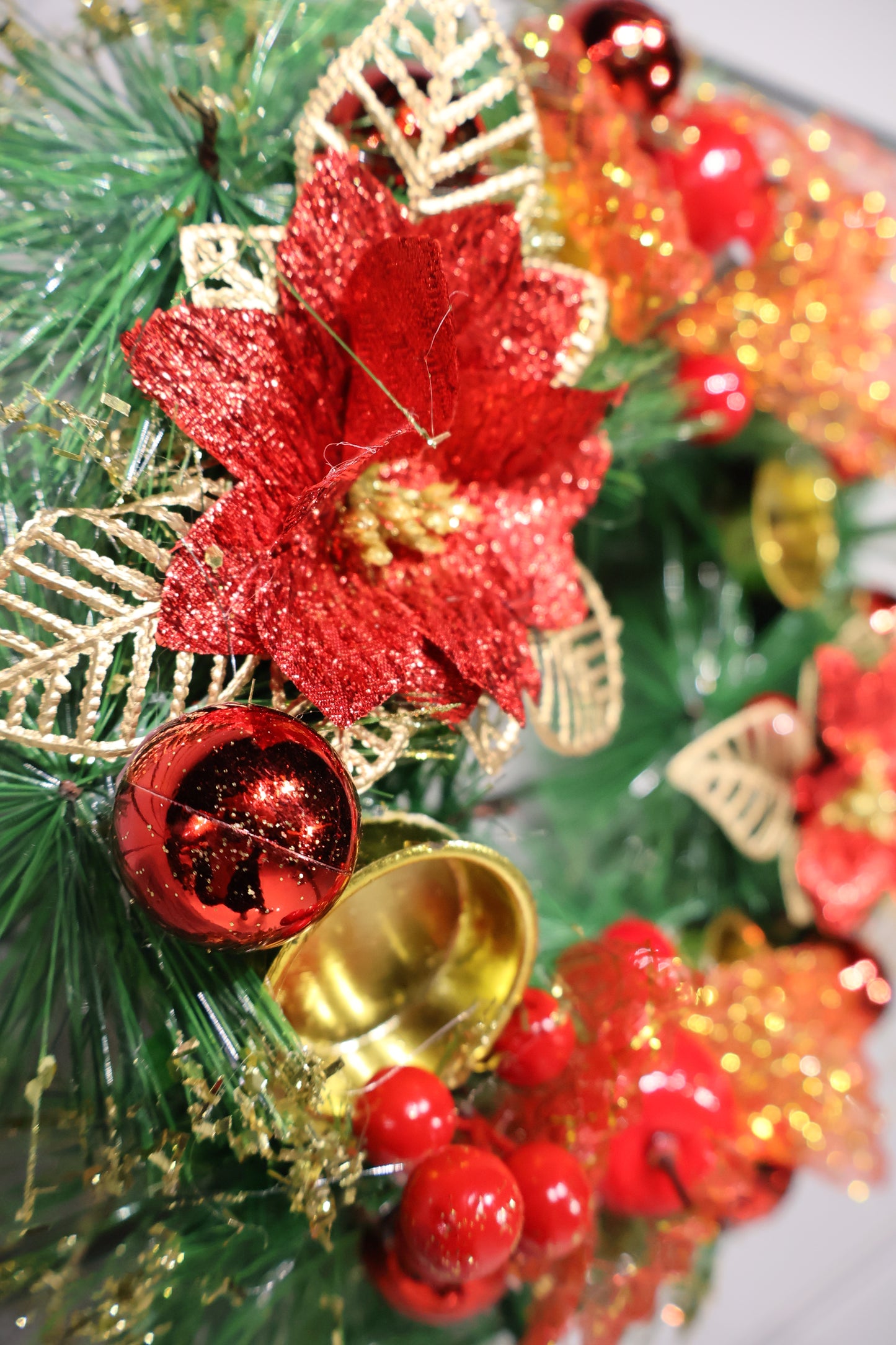 AG-63 | Christmas Wreath with Red Poinsettias and Gold Accents – 11.8" (30 cm) Diameter